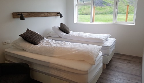 Habitación con 1 cama doble o 2 individuales, baño privado