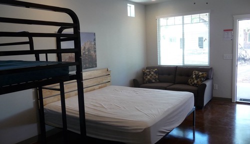 Estudio, varias camas