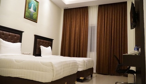 Habitación Deluxe con 1 cama doble o 2 individuales