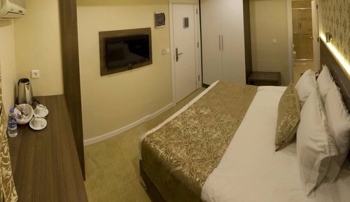 Habitación estándar con 1 cama doble o 2 individuales