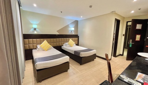 Habitación exclusiva con 2 camas individuales