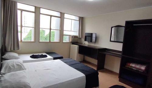Habitación cuádruple, varias camas