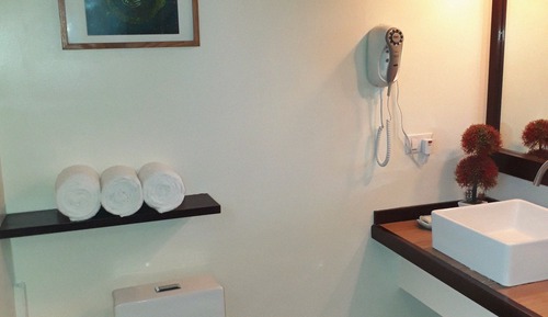 Habitación triple, vistas al mar