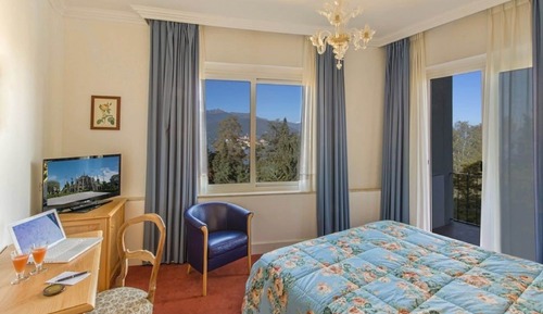 Habitación con 1 cama doble o 2 individuales, vistas al lago