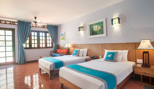Habitación con 2 camas individuales, frente a la playa (Villa Suite)