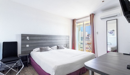 Habitación Confort con 1 cama doble o 2 individuales