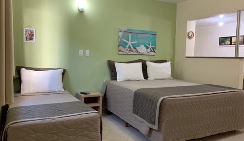 Habitación triple, frigorífico y microondas, planta baja