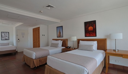 Habitación ejecutiva, varias camas