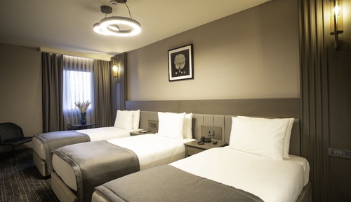 Habitación triple Deluxe