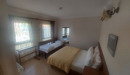 Habitación triple económica