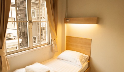 Single Bed with Shared Bathroom