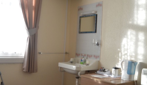 Habitación triple básica, baño compartido