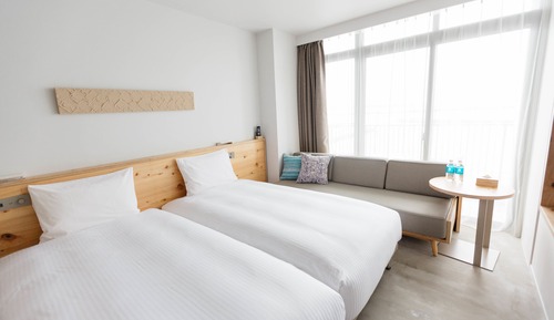 Habitación estándar con 2 camas individuales, varias camas