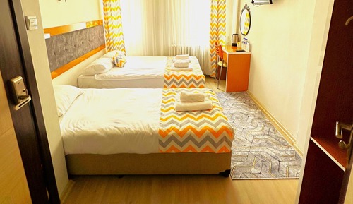 Habitación triple estándar, balcón