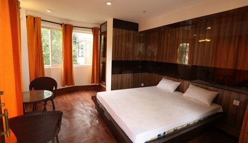 Estudio Deluxe, 1 cama de matrimonio grande, vistas al jardín, en la zona del jardín