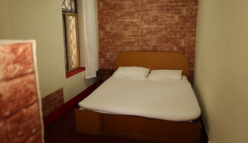 Habitación estándar con 1 cama doble o 2 individuales