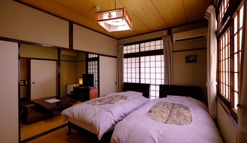 Suite Deluxe, 2 habitaciones, vistas al jardín (Non Smoking)