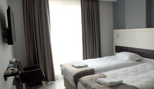Habitación Confort con 1 cama doble o 2 individuales