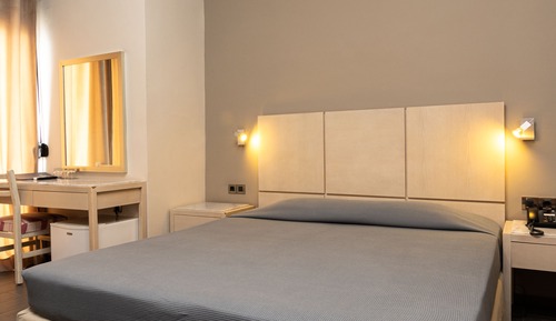 Habitación triple, vistas al mar