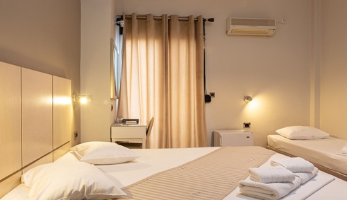 Habitación triple, vistas a la ciudad