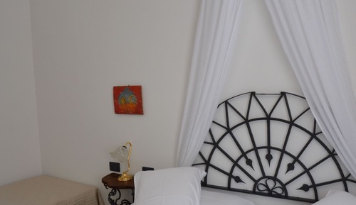 Habitación triple, vistas a la ciudad