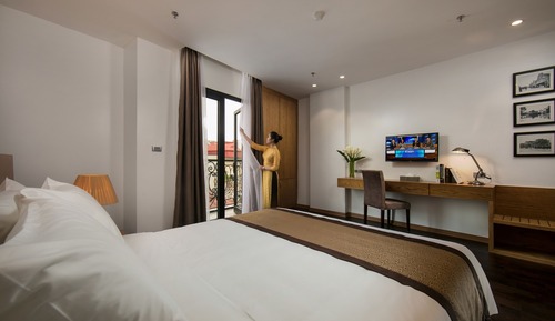 Habitación ejecutiva con 1 cama doble o 2 individuales, balcón