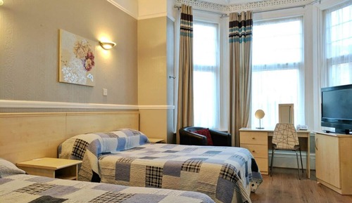 Habitación familiar, varias camas