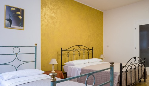 Habitación cuádruple Confort, en una planta alta