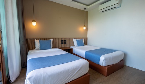 Habitación Deluxe con 2 camas individuales, junto a la piscina