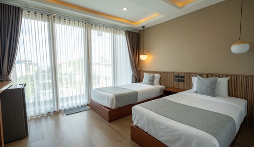 Habitación Deluxe con 2 camas individuales, vistas a la piscina