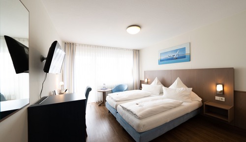 Habitación superior con 1 cama doble o 2 individuales