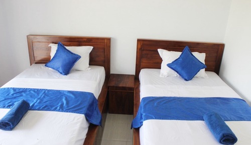 Habitación con 2 camas individuales, vistas al jardín (With AC)