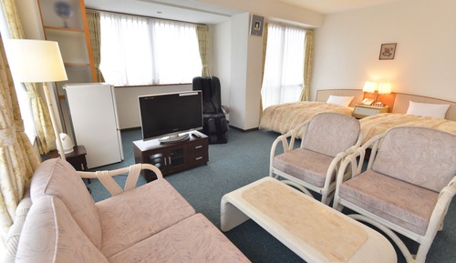 Habitación triple, fumadores