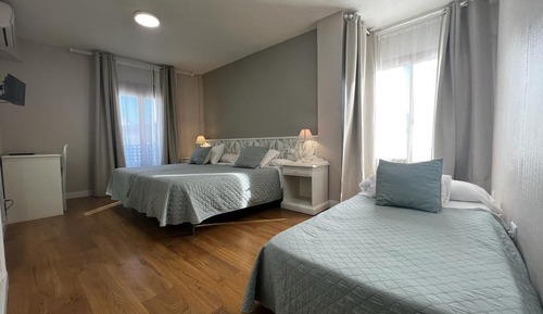 Habitación triple estándar, varias camas