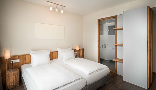 Habitación Business con 1 cama doble o 2 individuales