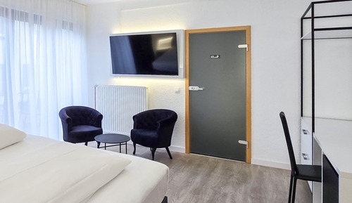 Habitación Confort con 1 cama doble o 2 individuales