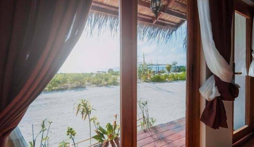 Habitación Deluxe con 1 cama doble o 2 individuales, vistas al mar, frente a la playa