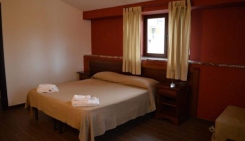 Habitación triple exclusiva, varias camas