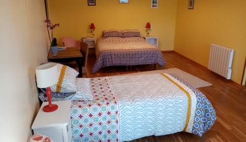 Habitación triple familiar, vistas al jardín