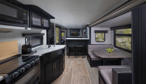 Elite Caravan Framed by Peaks with Complimentary Adventure Activities