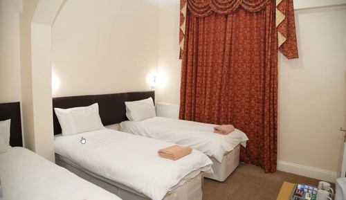 Habitación triple Deluxe, baño privado