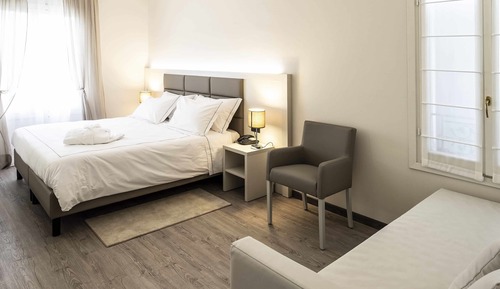 Habitación cuádruple junior, vistas al jardín