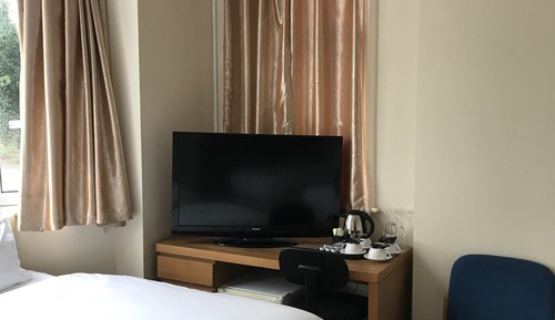 Habitación cuádruple, varias camas