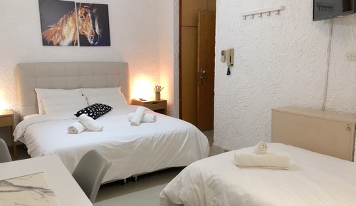 Habitación triple Deluxe