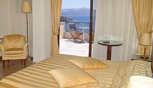 Habitación triple, vistas al mar