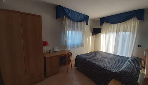Habitación estándar con 1 cama doble o 2 individuales