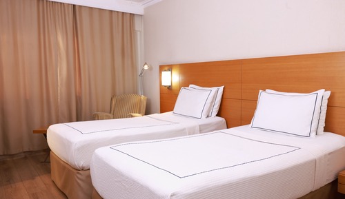 Habitación superior, varias camas