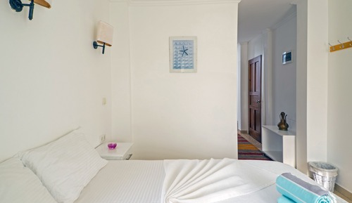 Habitación Deluxe, 1 cama de matrimonio con sofá cama, vistas parciales al mar