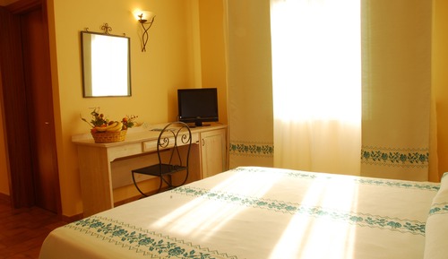 Habitación Confort con 1 cama doble o 2 individuales, vistas al jardín