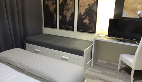 Habitación triple Confort, baño privado